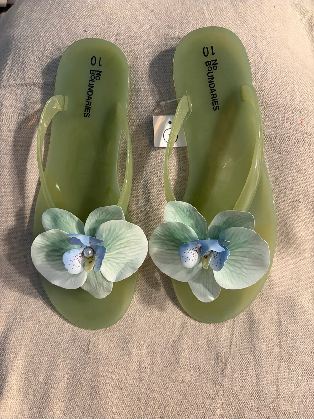 No Boundaries Green Floral Jelly Sandals with Orchid Accent